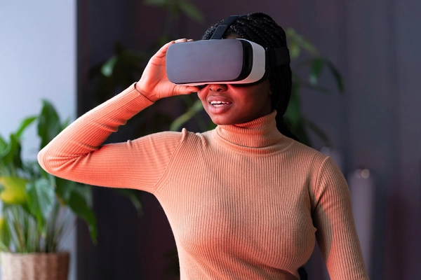 Customer with a VR headset interacting with the metaverse ecommerce space